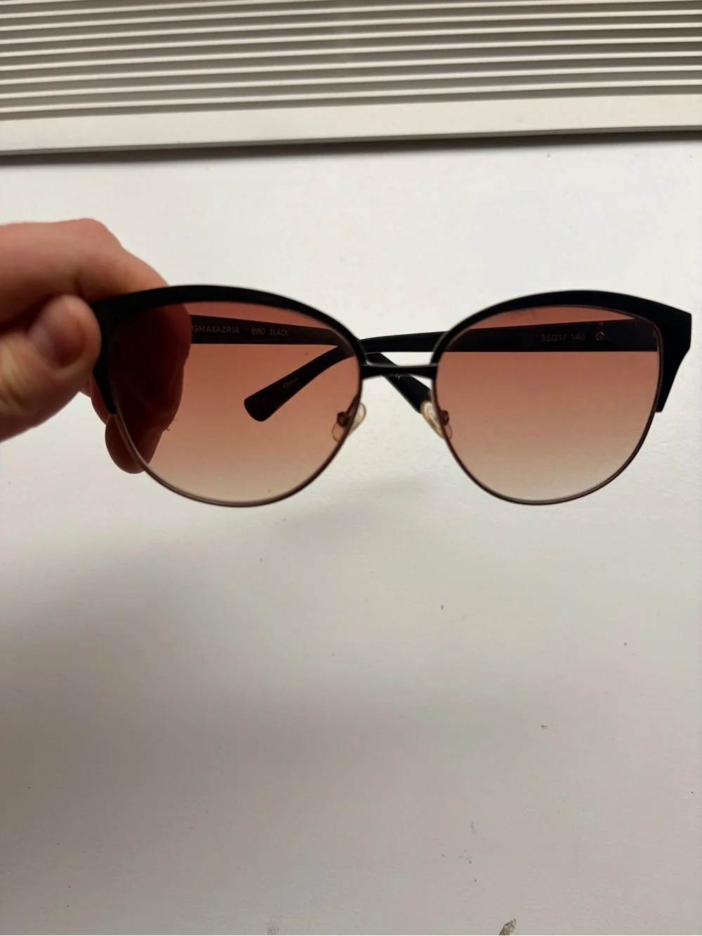 BCBGMaxAzria Black Frame Sunglasses with Rose Gradient Lenses